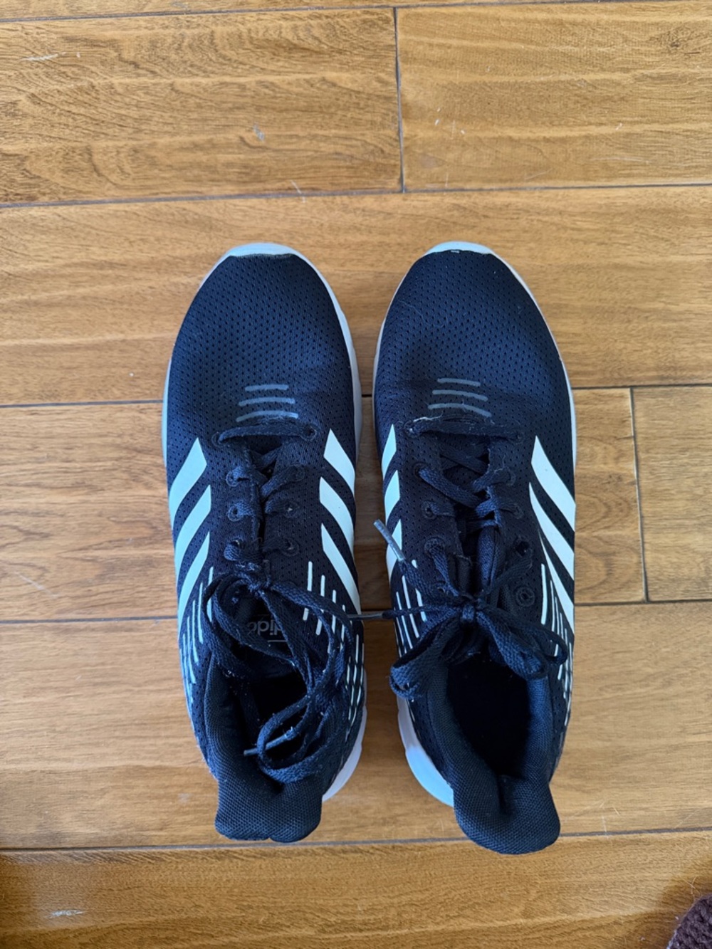 adidas Black Sneakers with White Stripe Accents